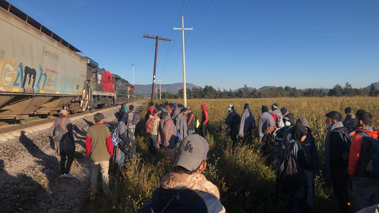 Migrants next to the tracks of "La Bestia" in Jesús de Nazaret in the municipality of Chalchicomula de Sesna, Puebla.